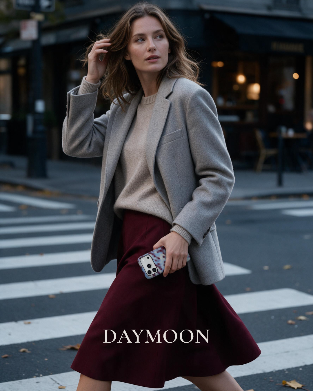 Hazy Dot phone case styled with a grey jacket