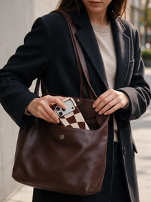 Cocoa Ripple phone case in an everyday bag relation scene