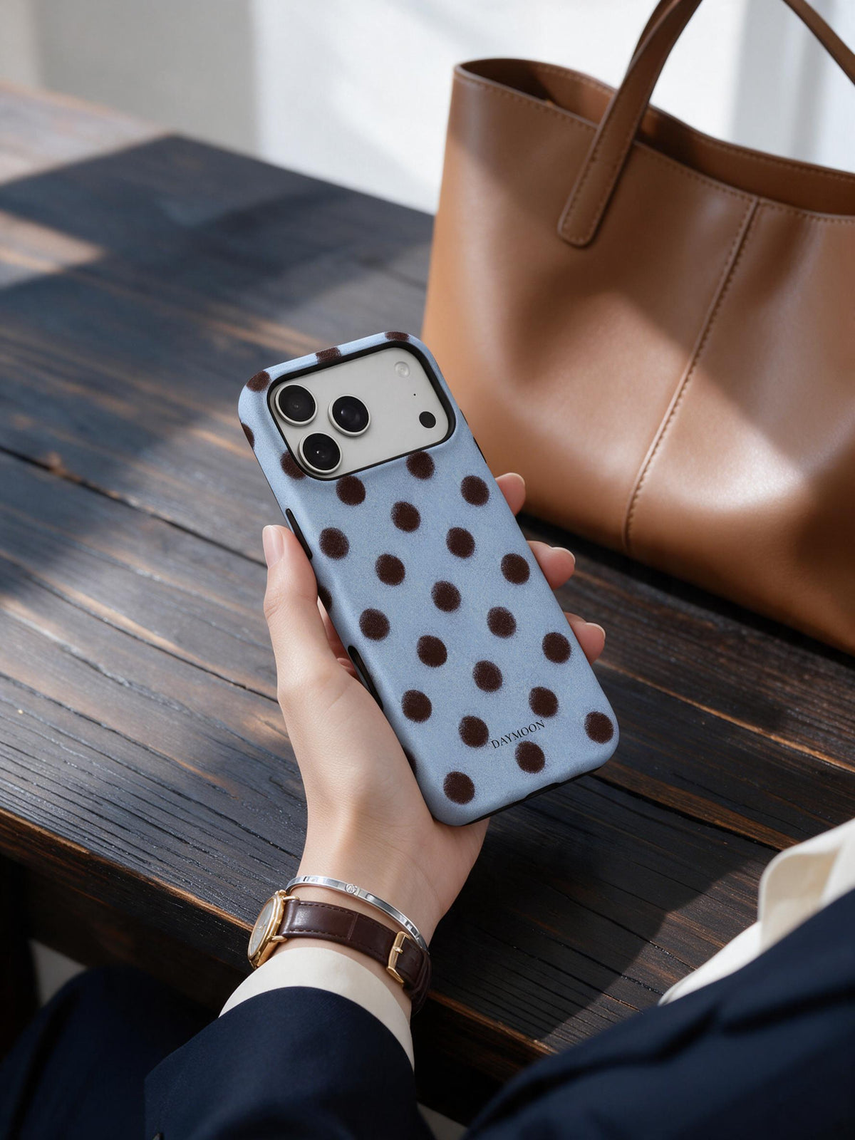 Cocoa Rhythm phone case in an everyday follow reference scene