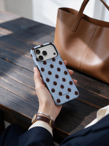 Cocoa Rhythm phone case in an everyday follow reference scene