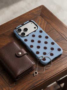 Cocoa Rhythm phone case in an everyday daily still life scene