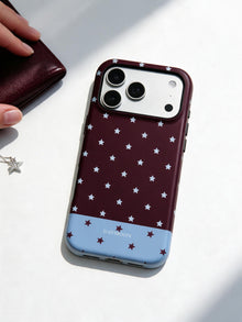 Burgundy Stars phone case in an everyday follow reference scene