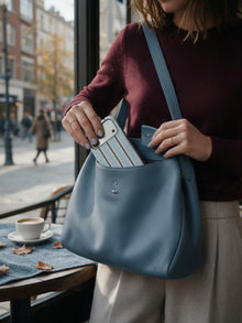 Dusty Stripe phone case in an everyday bag relation scene