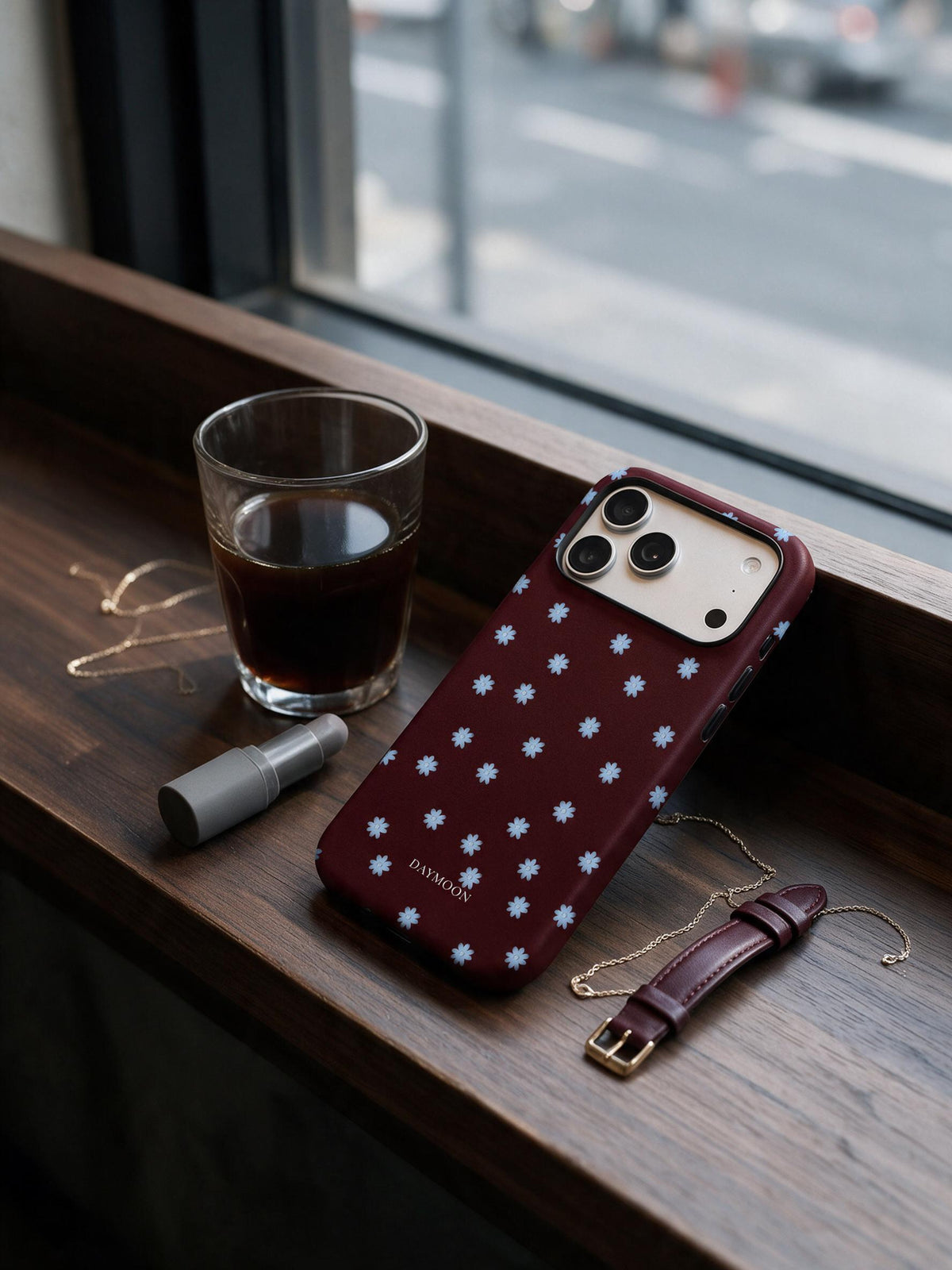 Wine Bloom phone case in an everyday daily still life scene