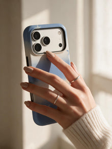 Drifting Stars phone case in an everyday hand detail scene