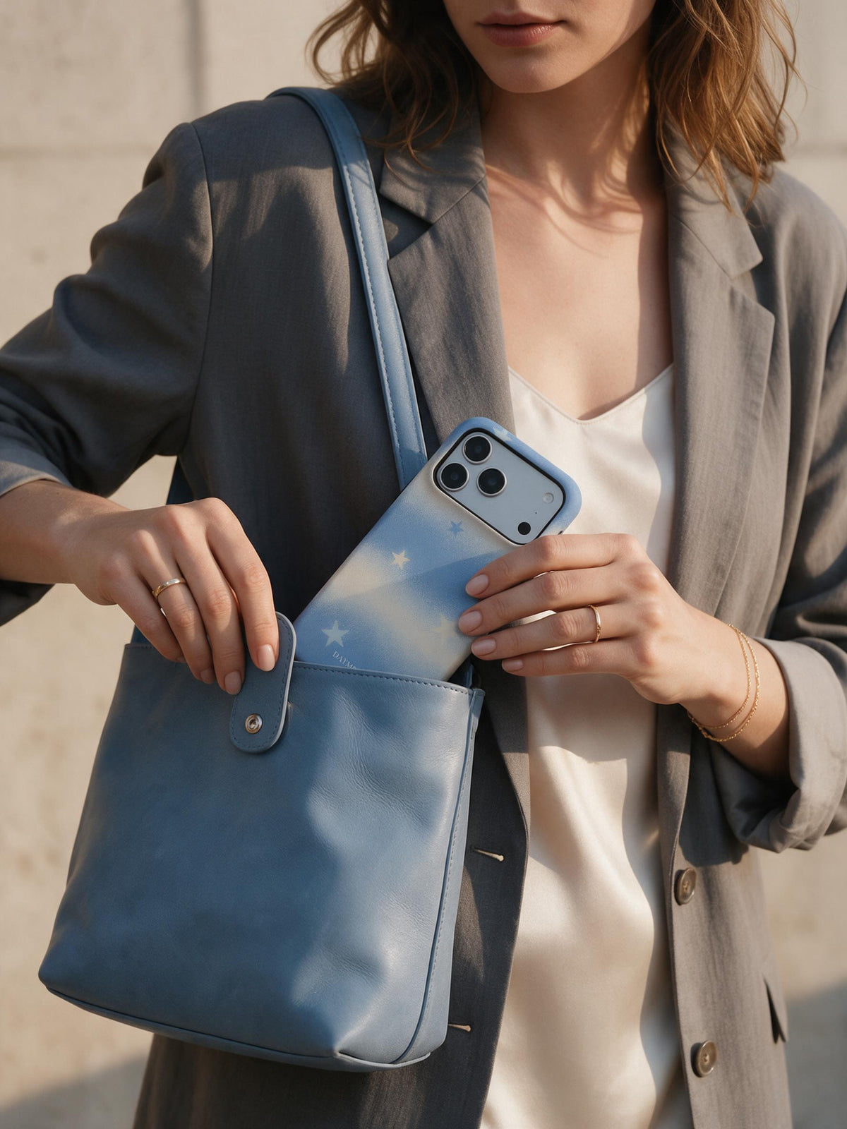Drifting Stars phone case in an everyday bag relation scene